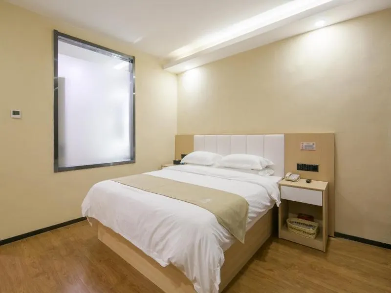 Bed in GreenTree Qindao Chengyang Zhengyang Middle Road Wanda Hotel