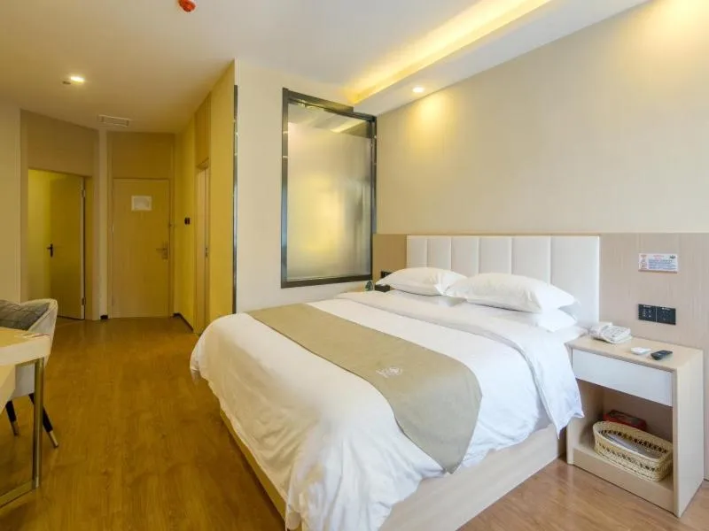 Bed in GreenTree Qindao Chengyang Zhengyang Middle Road Wanda Hotel