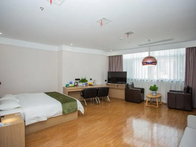 Bed in GreenTree Inn Lu'an Kaihong Plaza Express Hotel