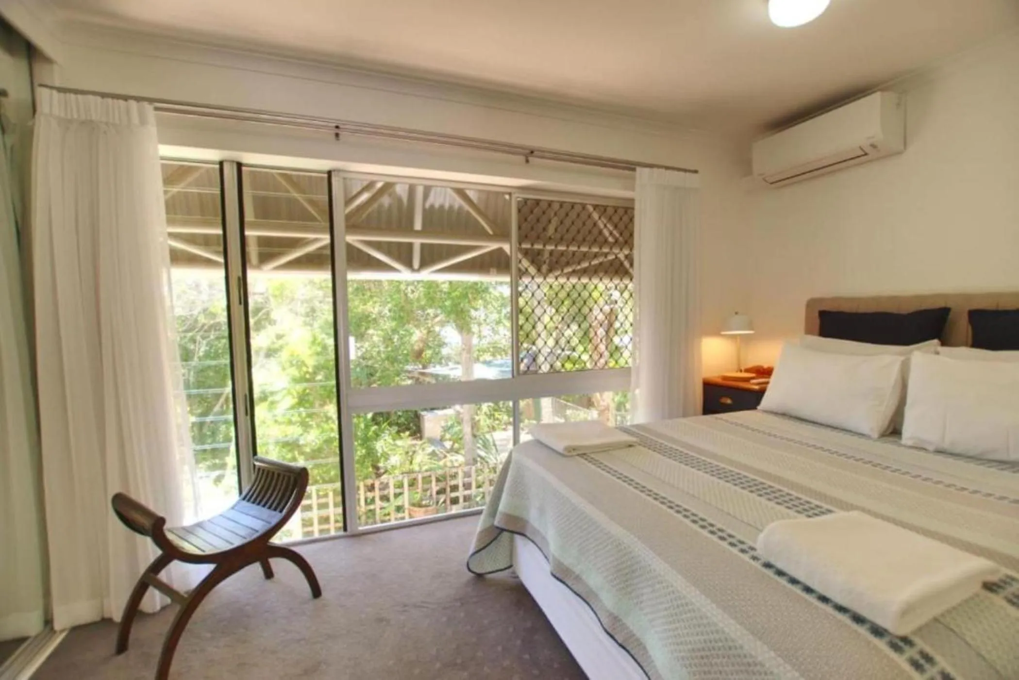 Bed in Raintrees Moffat Beach