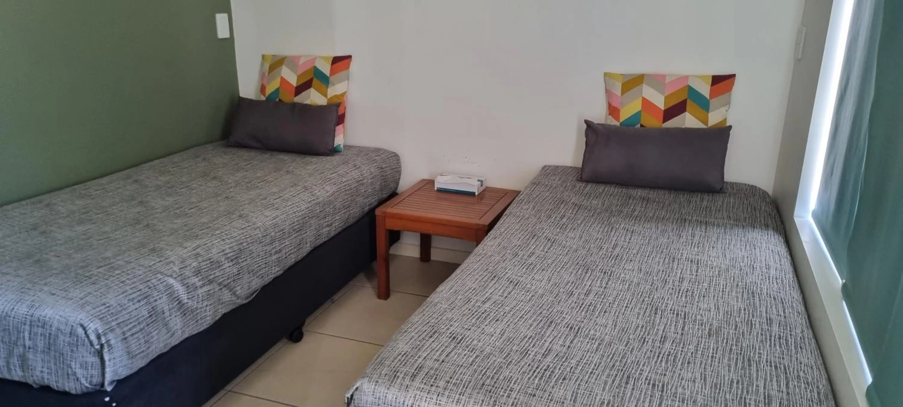 Bed in Ayr Traveller's Motel