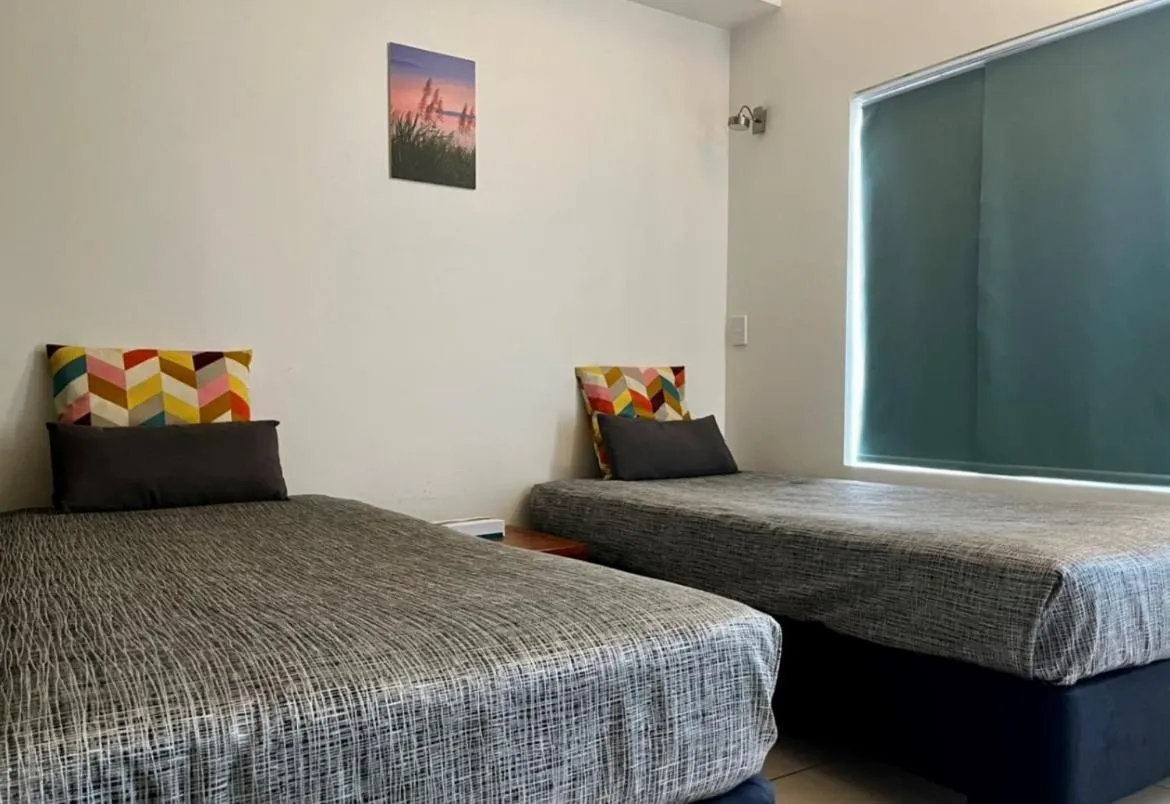 Bed in Ayr Traveller's Motel