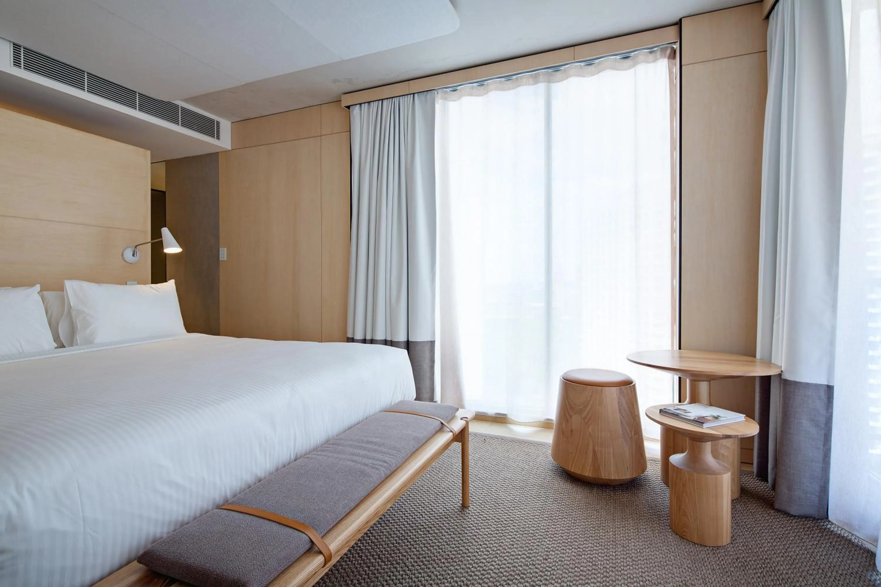 Bed in Zara Tower – Luxury Suites and Apartments