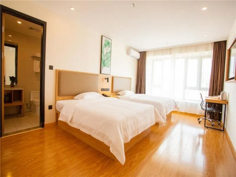 Bed in GreenTree Inn Qinzhou Qinzhou East Railway Station Hotel