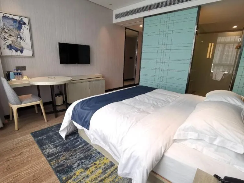 Bed in GreenTree Eastern Lianyungang Jiaruibao Plaza Hotel