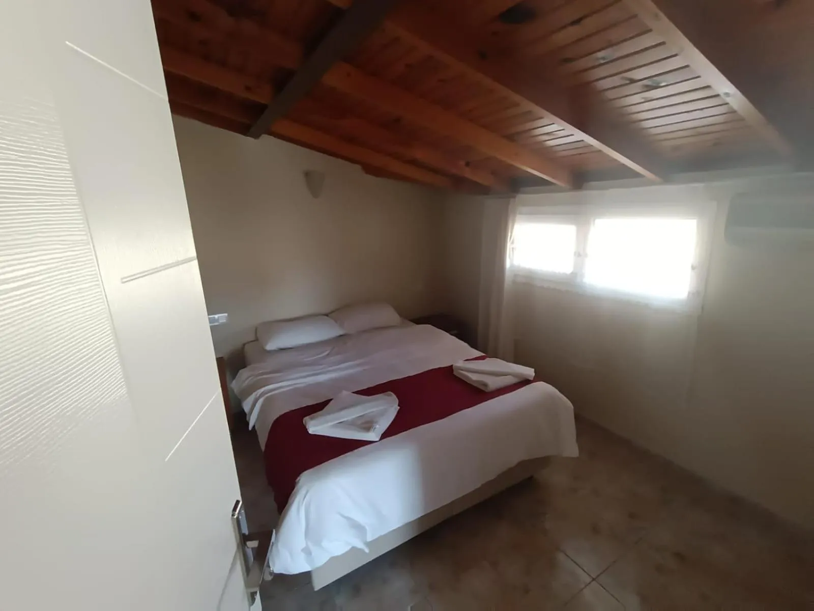 Bed in Dove Apart Hotel