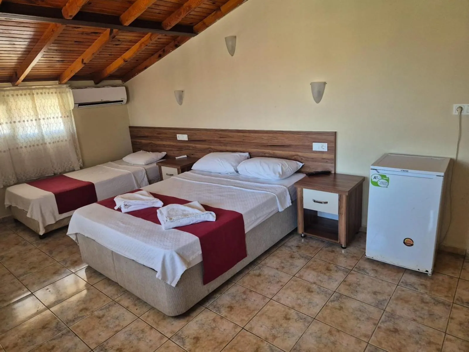 Bed in Dove Apart Hotel