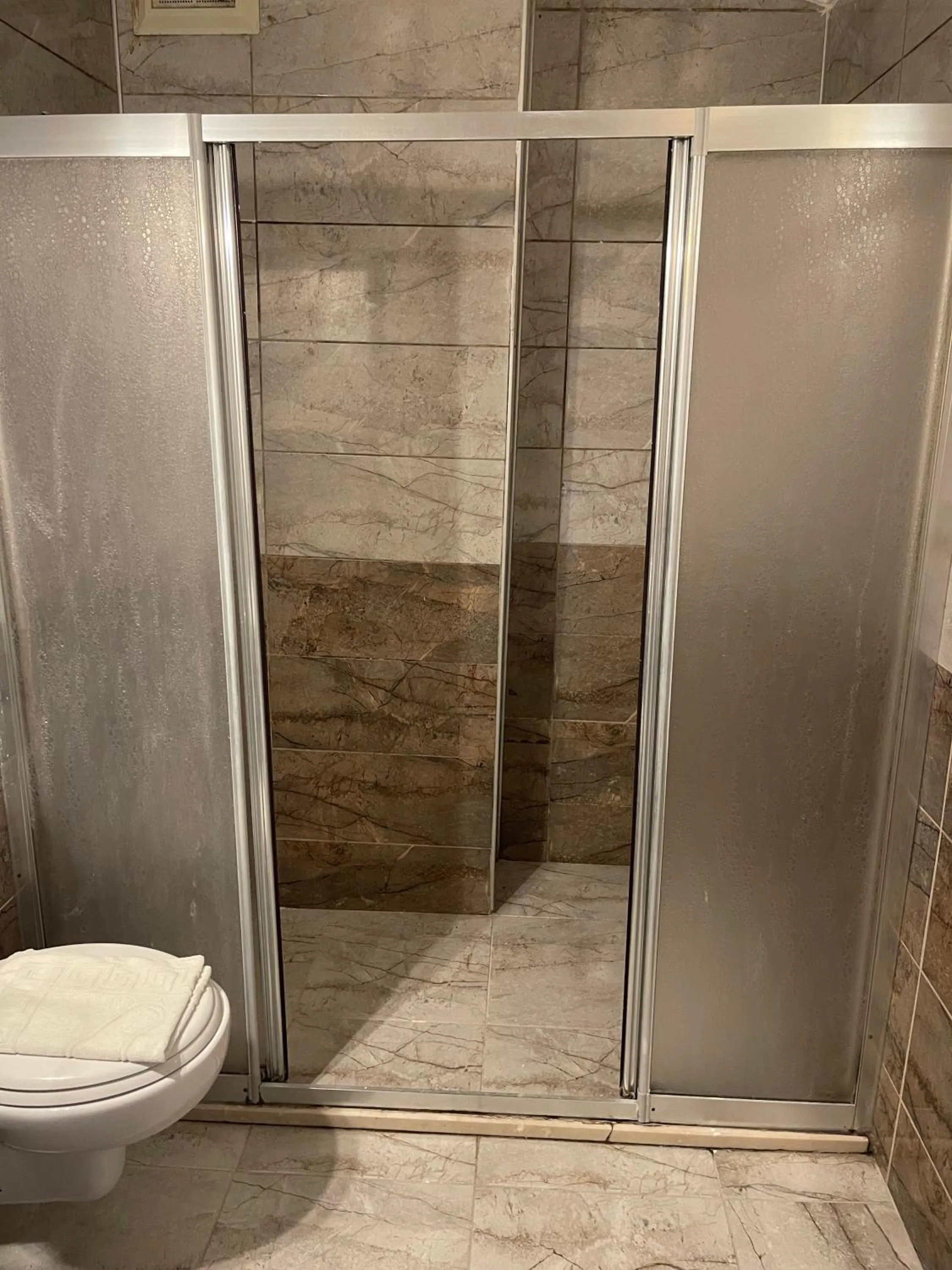 Shower in Dove Apart Hotel