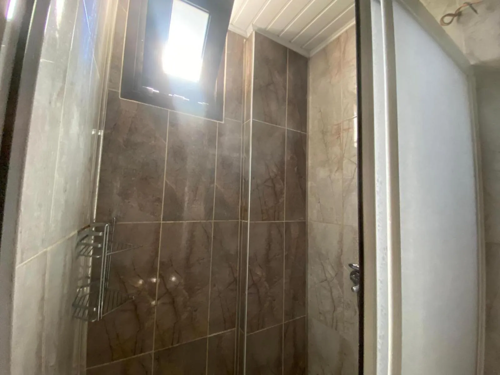 Shower in Dove Apart Hotel