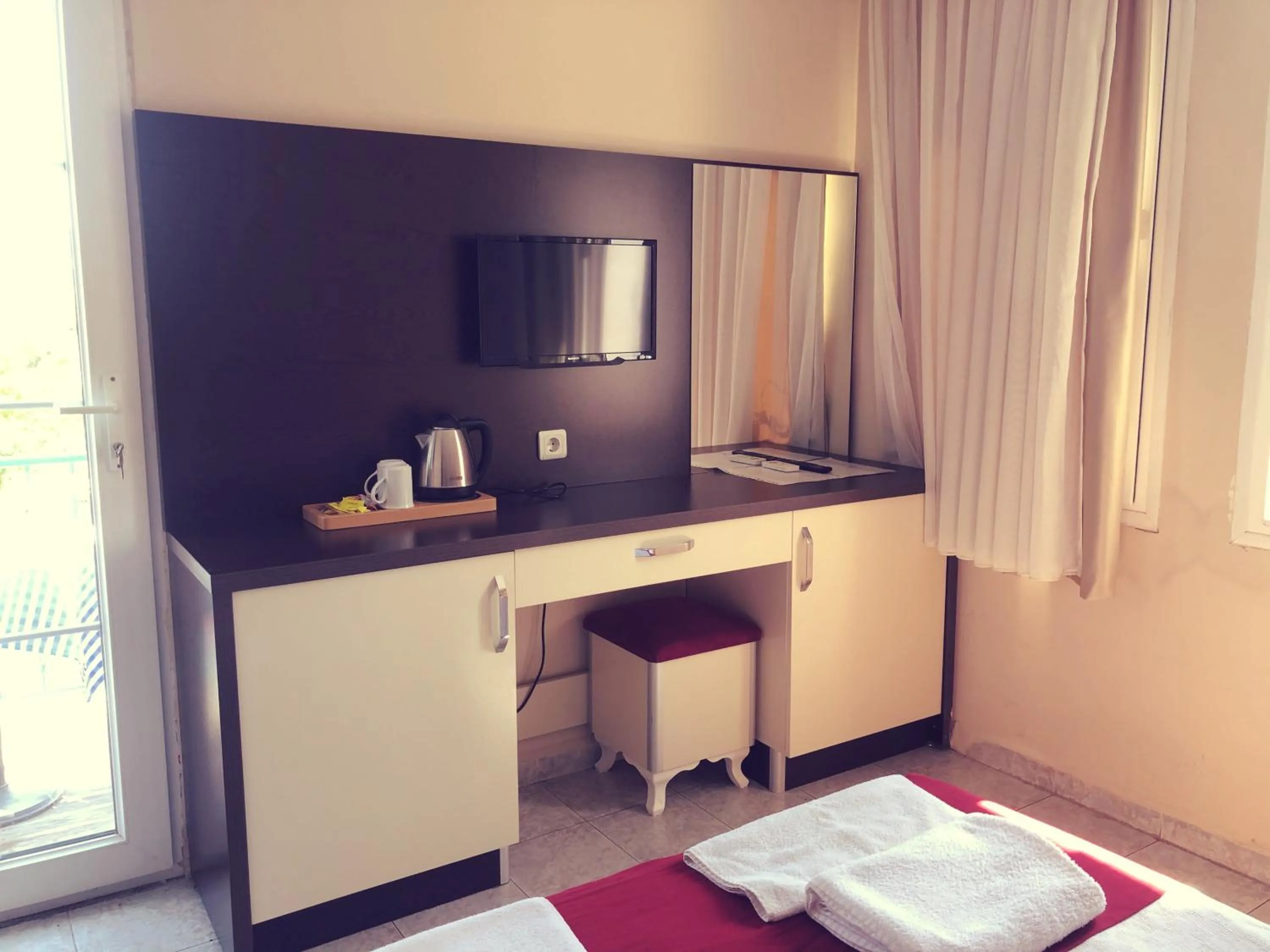 Bed in Dove Apart Hotel