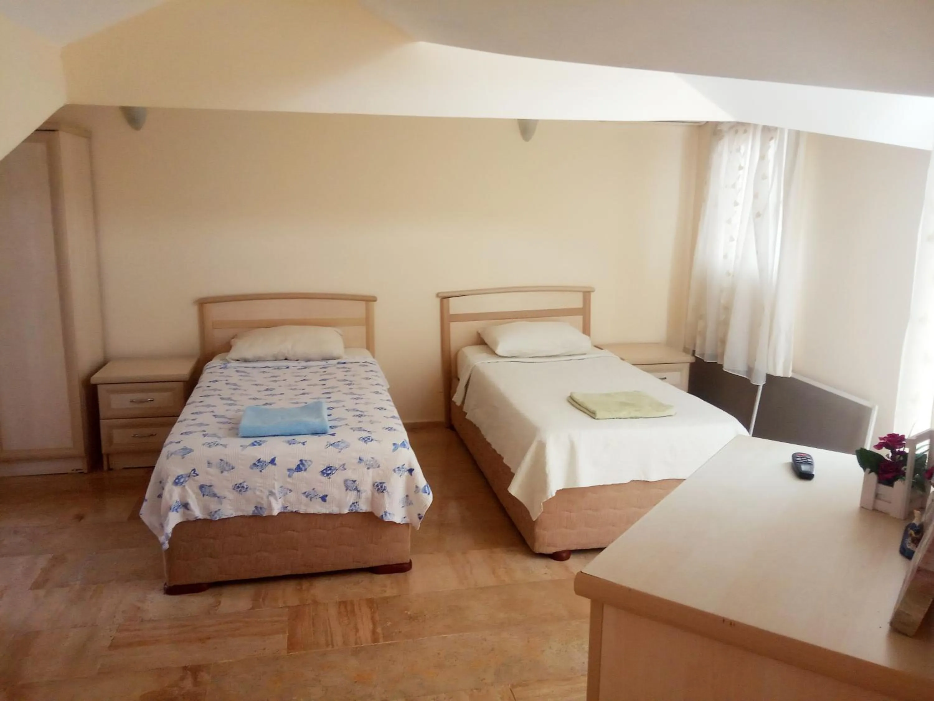 Bed in Dove Apart Hotel