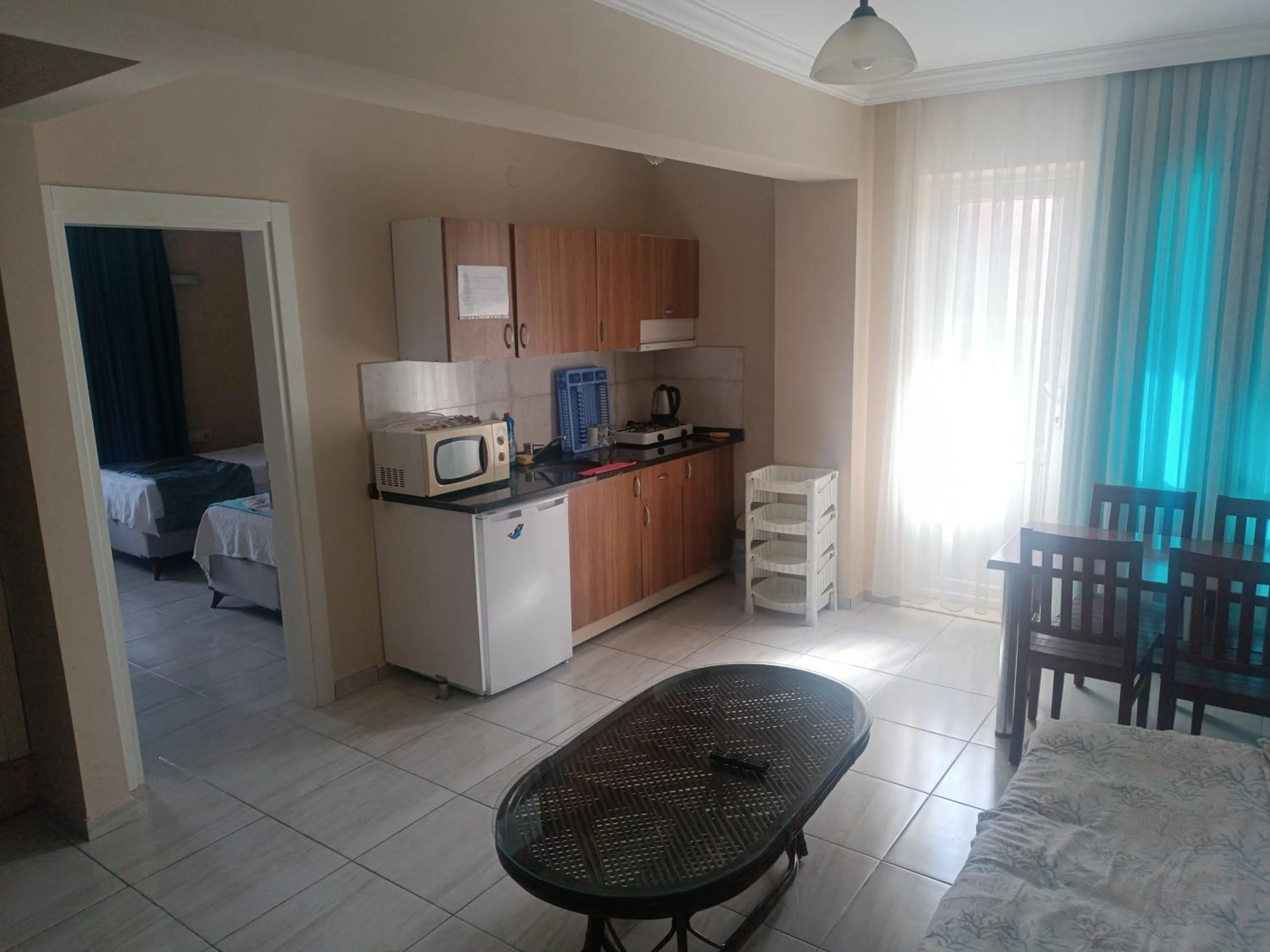 kitchen, Bed in Dove Apart Hotel