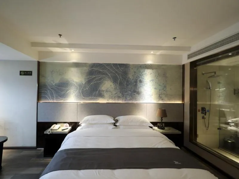 Bed in GreenTree Eastern Jingde Town Railway Station Hotel