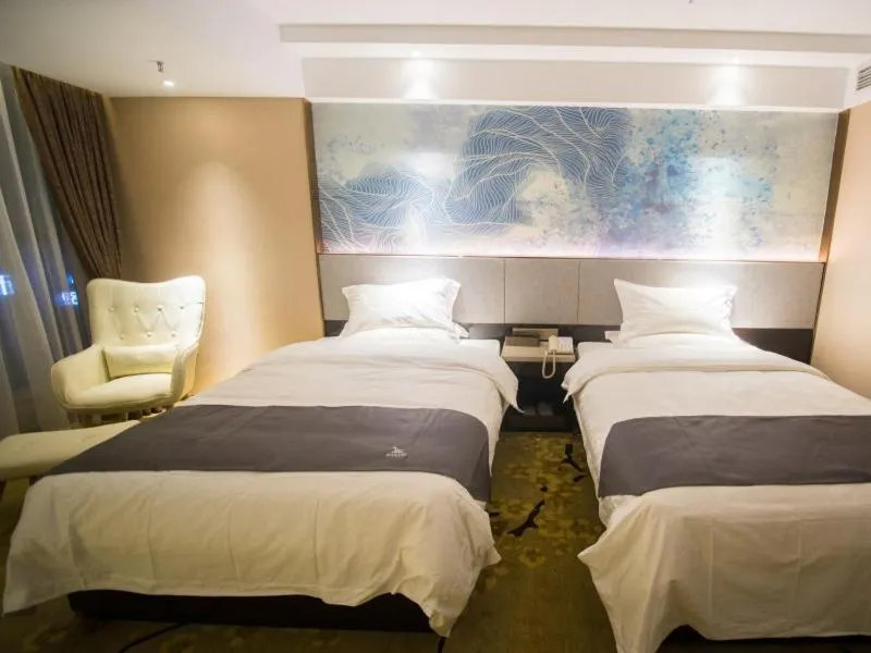 Bed in GreenTree Eastern Jingde Town Railway Station Hotel