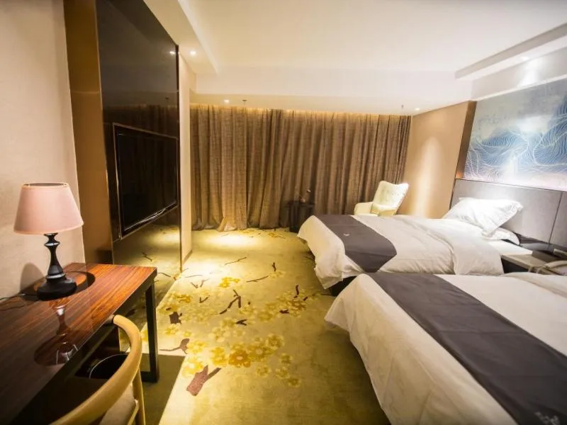 Bed in GreenTree Eastern Jingde Town Railway Station Hotel