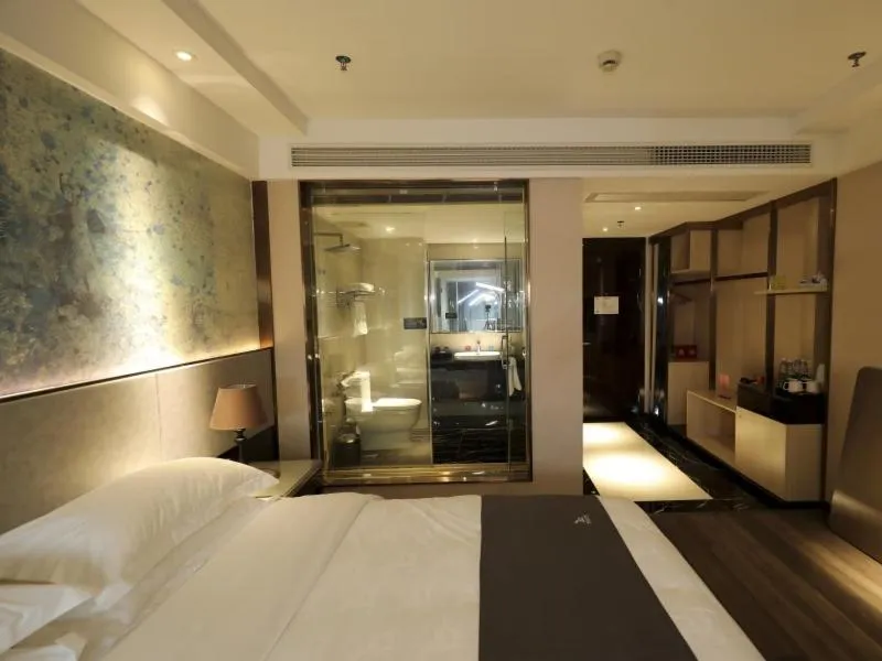 Bed in GreenTree Eastern Jingde Town Railway Station Hotel