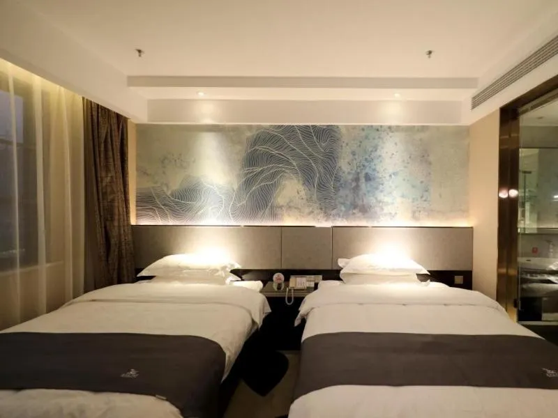 Bed in GreenTree Eastern Jingde Town Railway Station Hotel