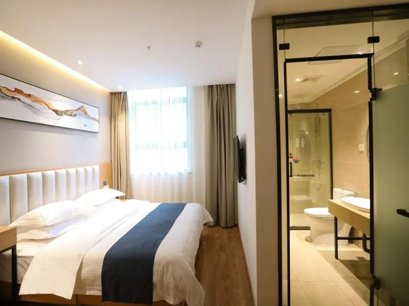 Bed in Shell Xinzheng Airport Port Huaxia Avenue Hotel