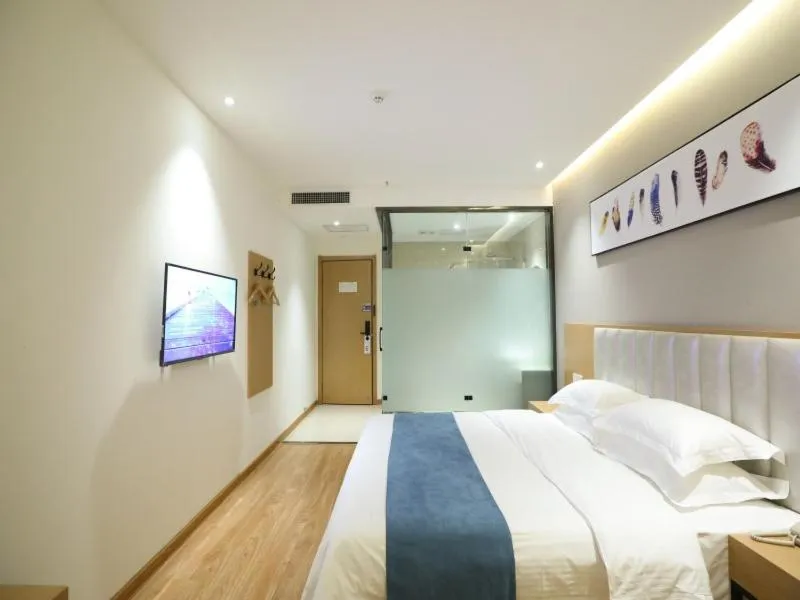 Bed in Shell Xinzheng Airport Port Huaxia Avenue Hotel