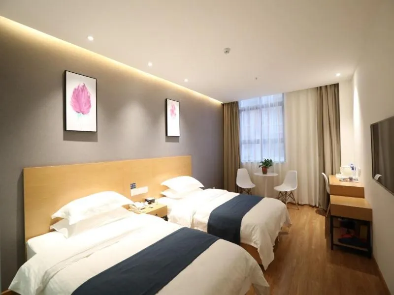 Bed in Shell Xinzheng Airport Port Huaxia Avenue Hotel