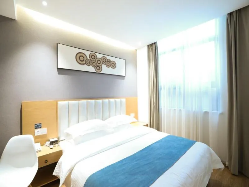 Bed in Shell Xinzheng Airport Port Huaxia Avenue Hotel