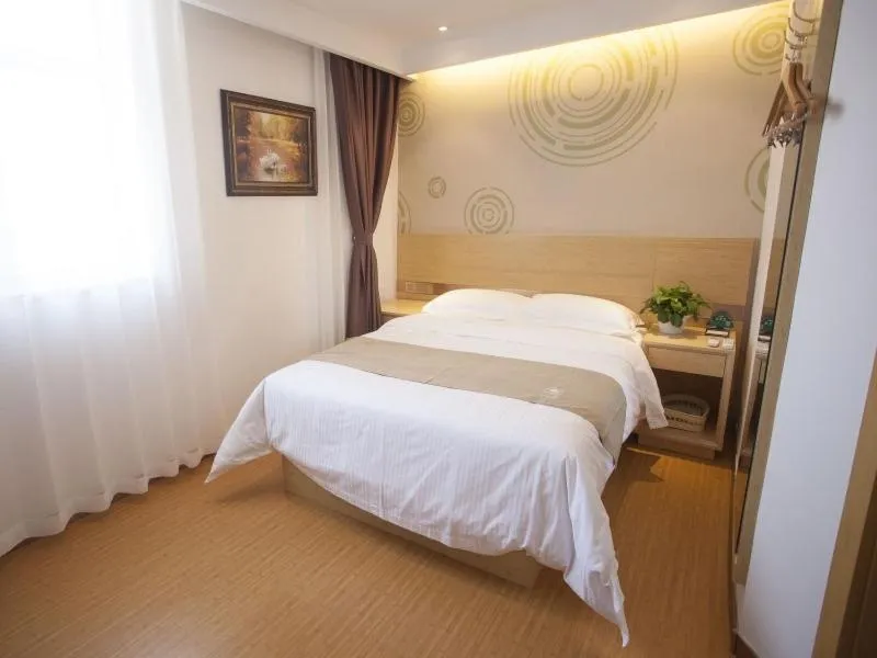 Bed in GreenTree Inn Zhangjiakou City Chicheng County Xiacheng Avenue Oriental Yijing Express Hotel