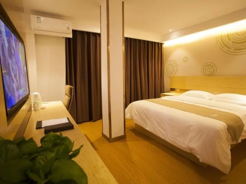 Bed in GreenTree Inn Zhangjiakou City Chicheng County Xiacheng Avenue Oriental Yijing Express Hotel