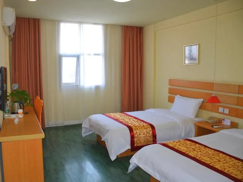 Bed in Shell Xinyu City Railway Station Plaza Hotel