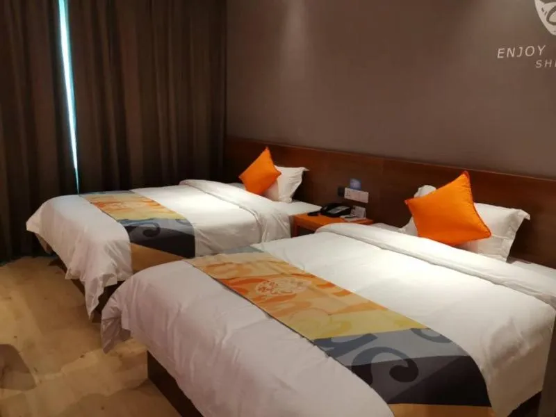 Bed in Shell Liaocheng Linqing City Bus Station Hotel