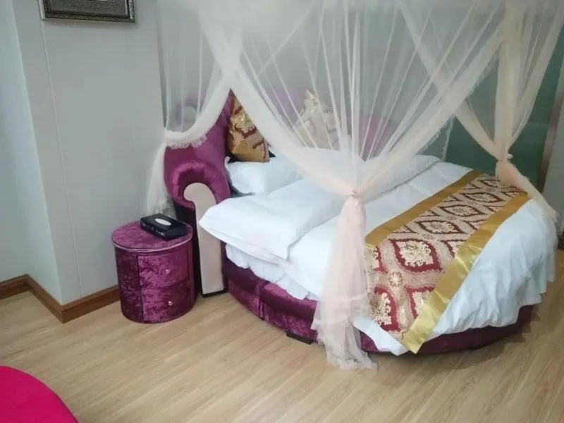 Bed in Shell Chongqing Chengkou County Passenger Transport Center Hotel