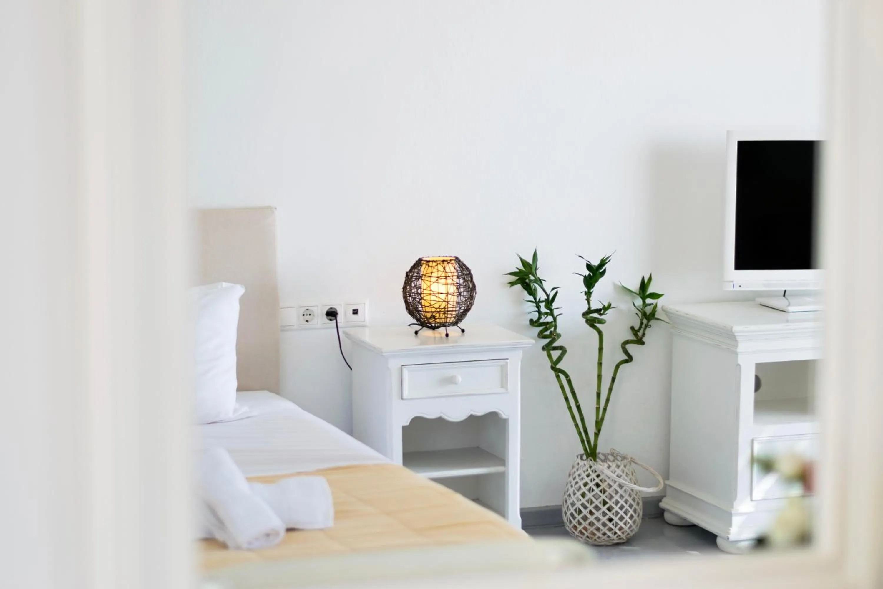 Bed in With-inn Mykonos Suites