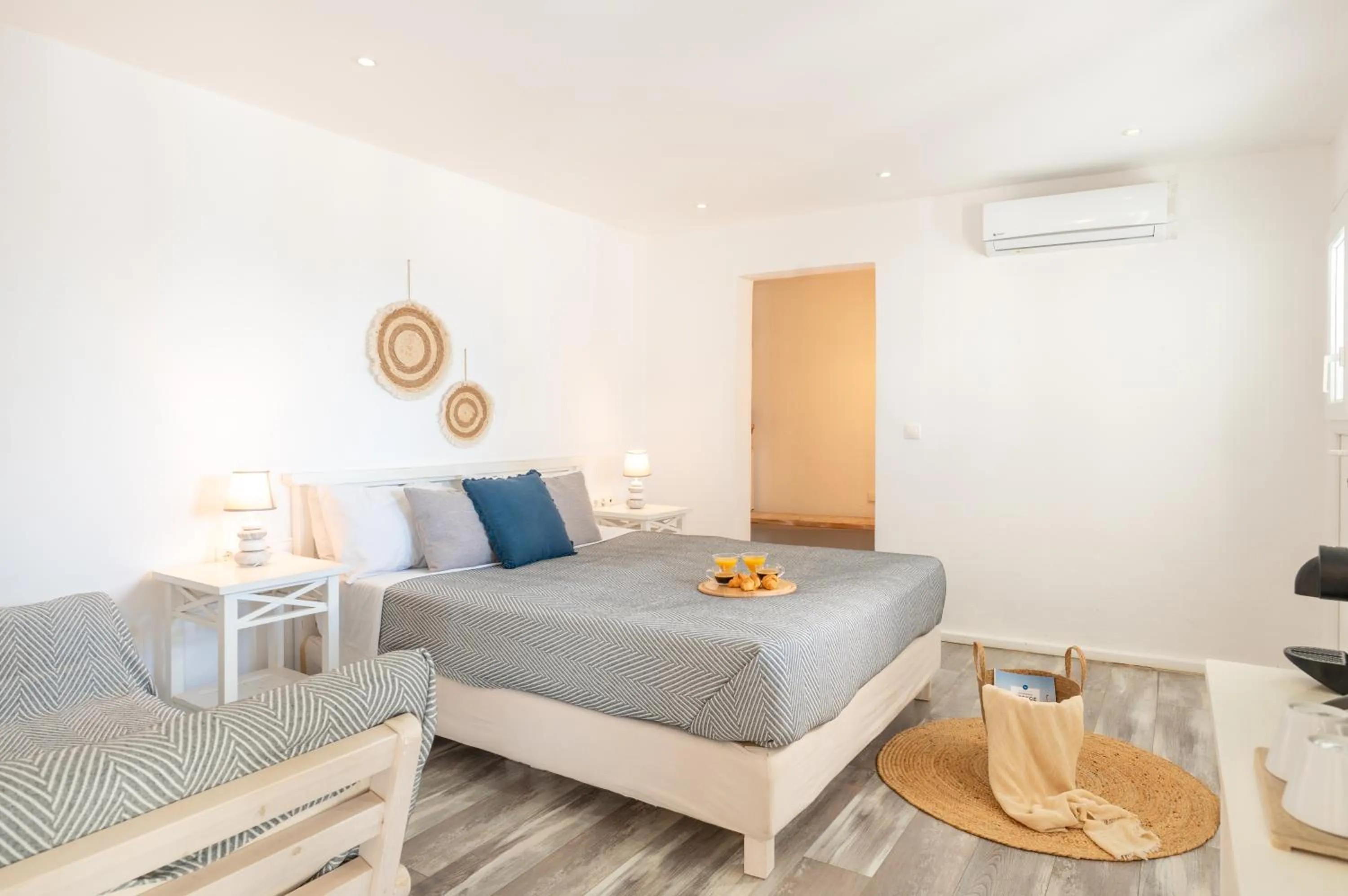 Bed in With-inn Mykonos Suites
