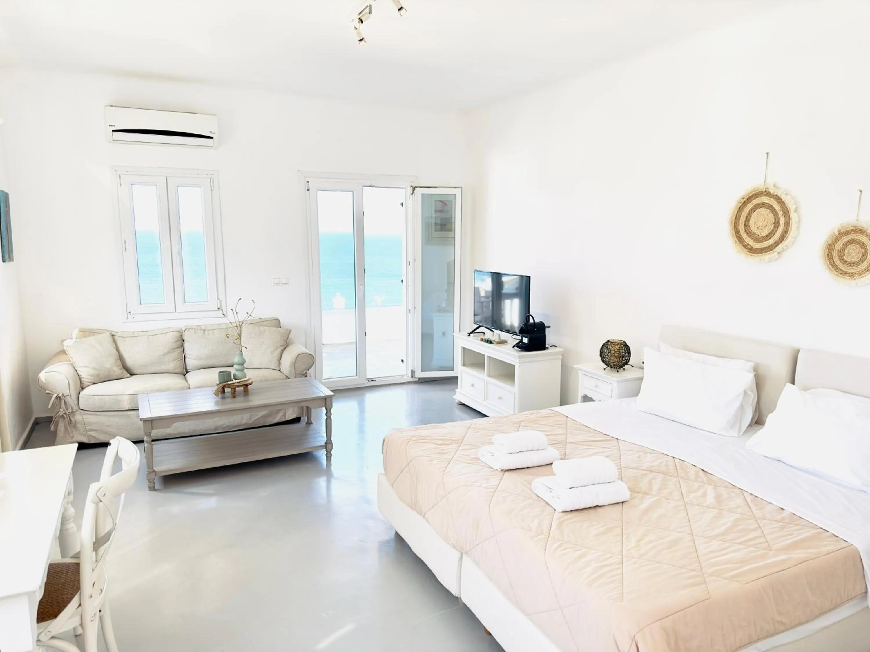 Bed in With-inn Mykonos Suites