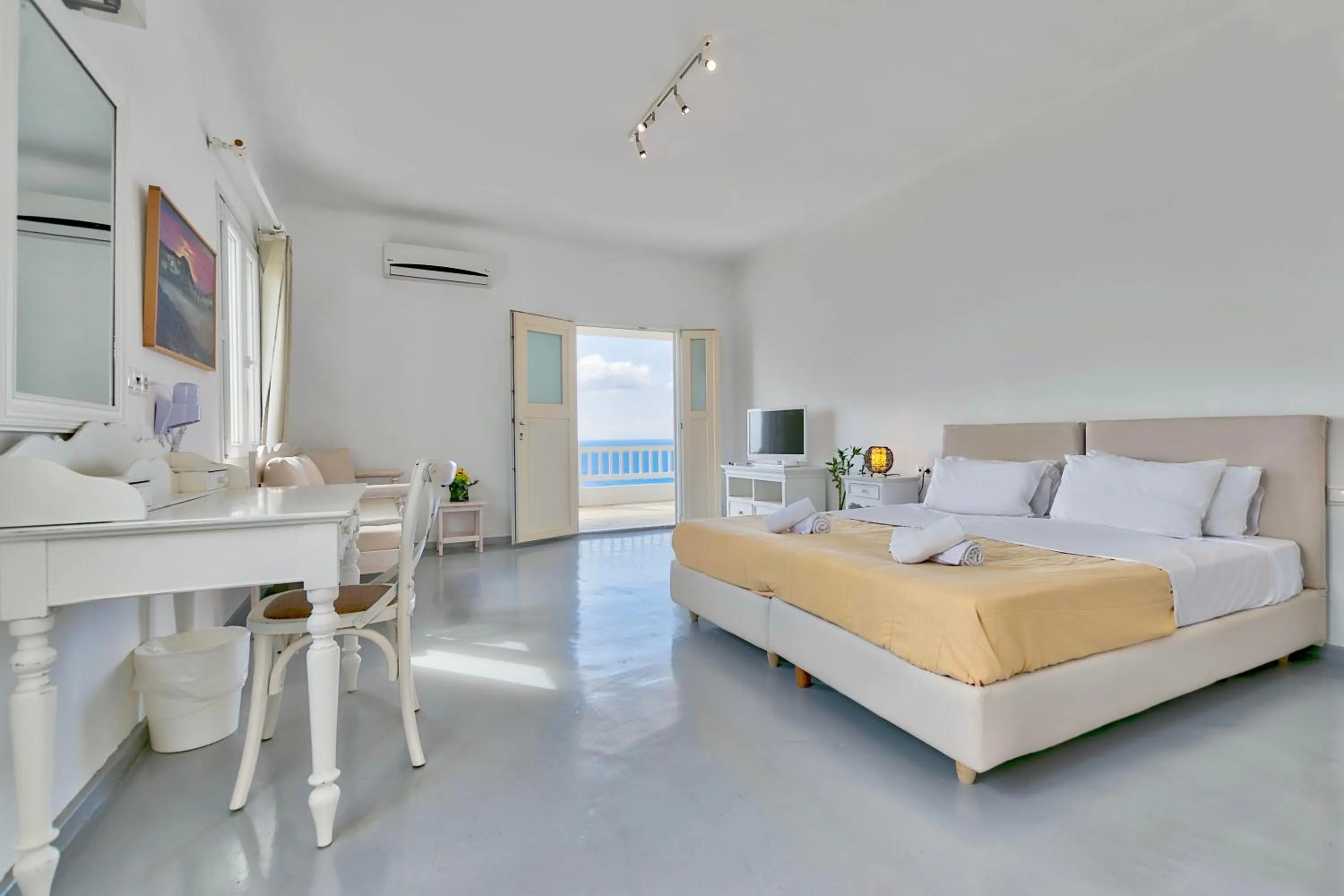 Bed in With-inn Mykonos Suites