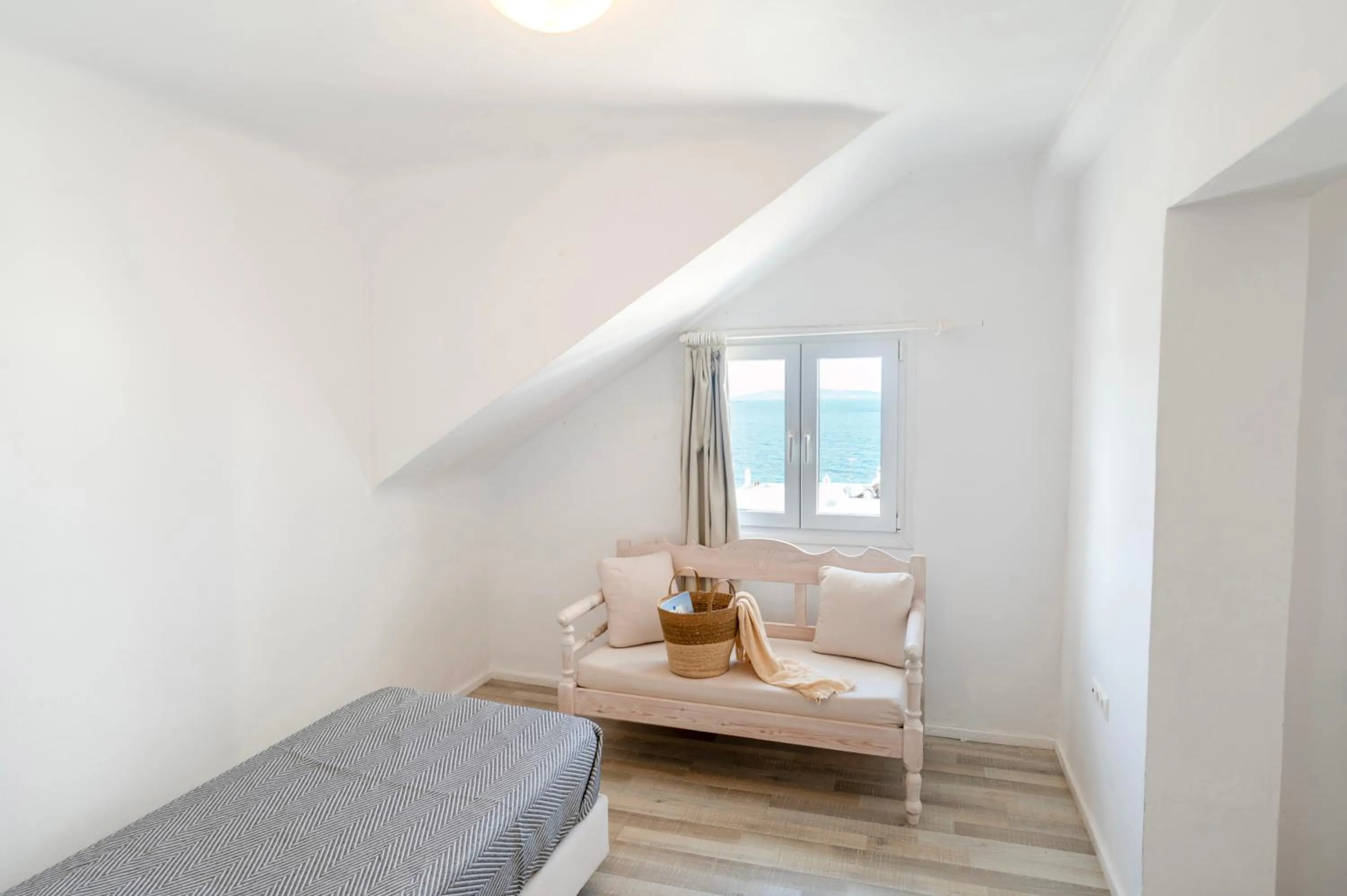 Bed in With-inn Mykonos Suites