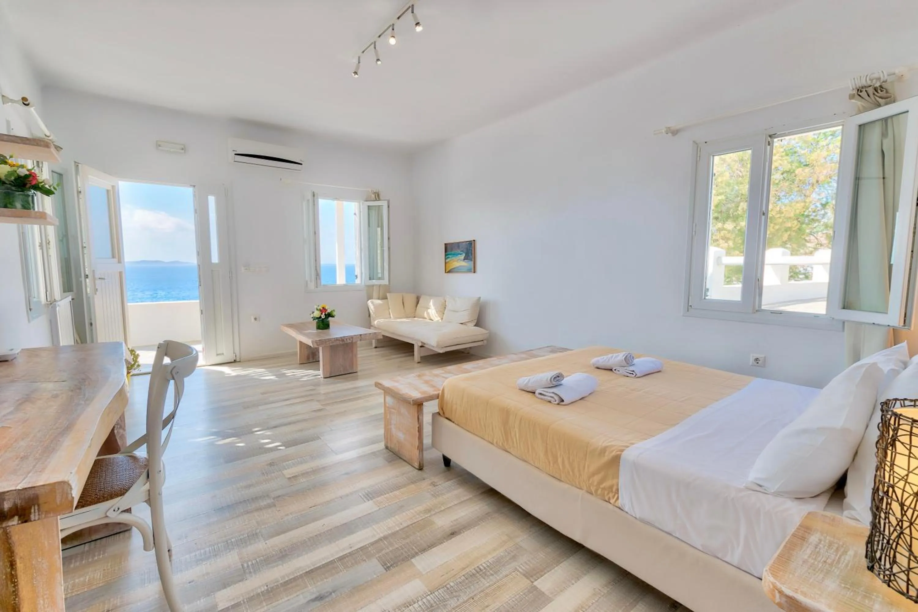 Bed in With-inn Mykonos Suites