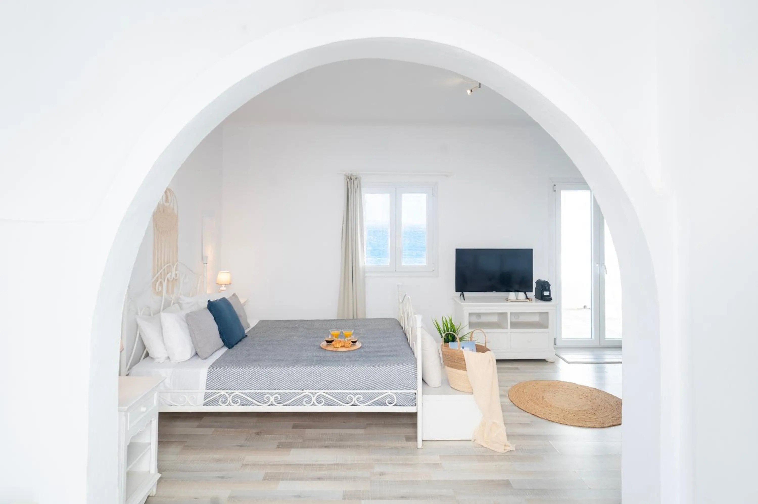 Bed in With-inn Mykonos Suites