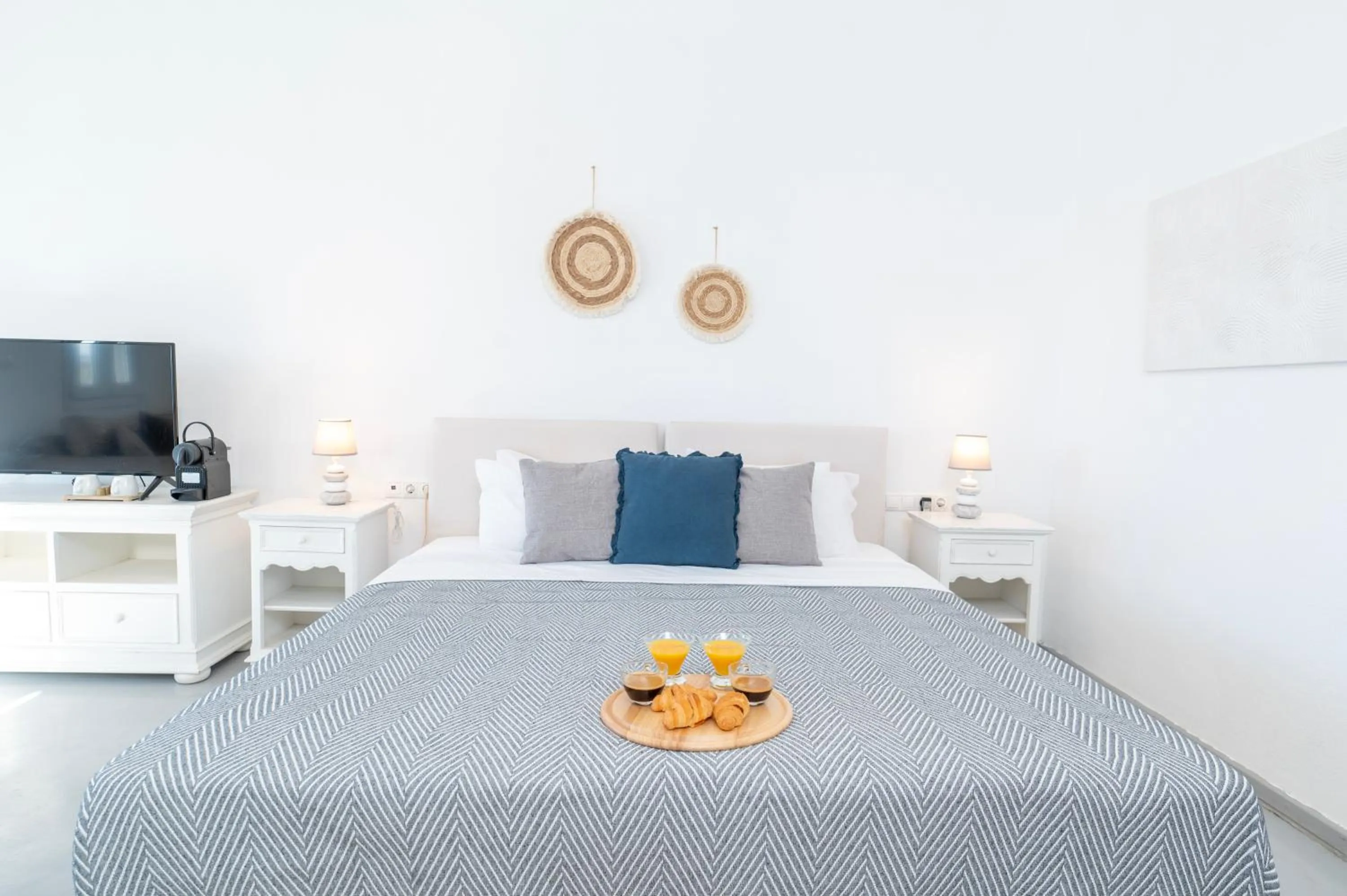 Bed in With-inn Mykonos Suites