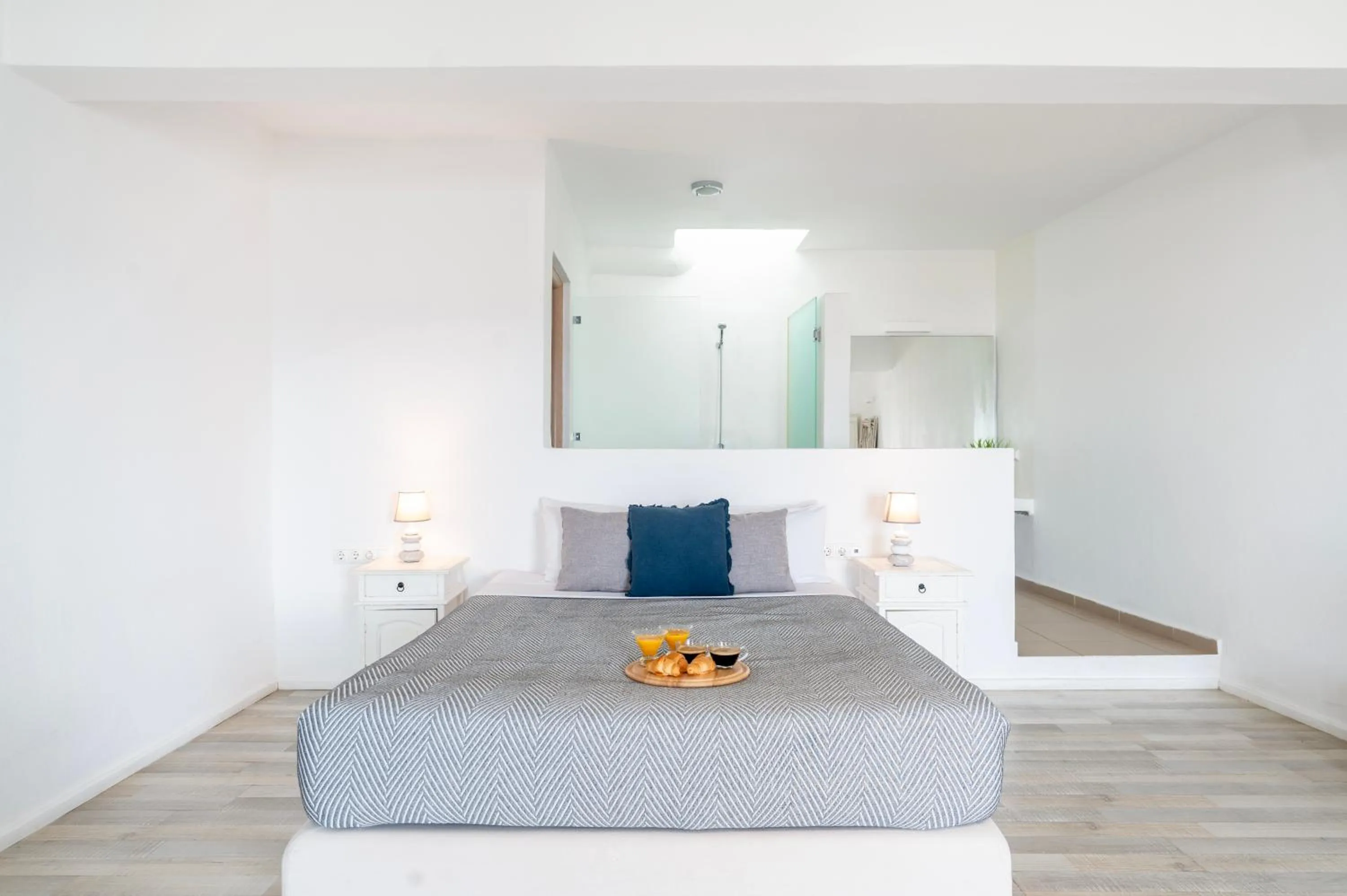 Bed in With-inn Mykonos Suites