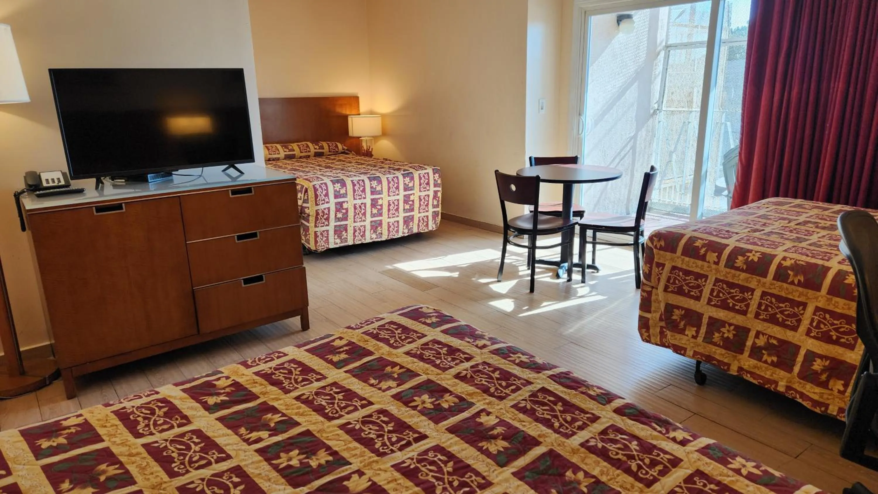 Bed in Royal Century Hotel at LAX