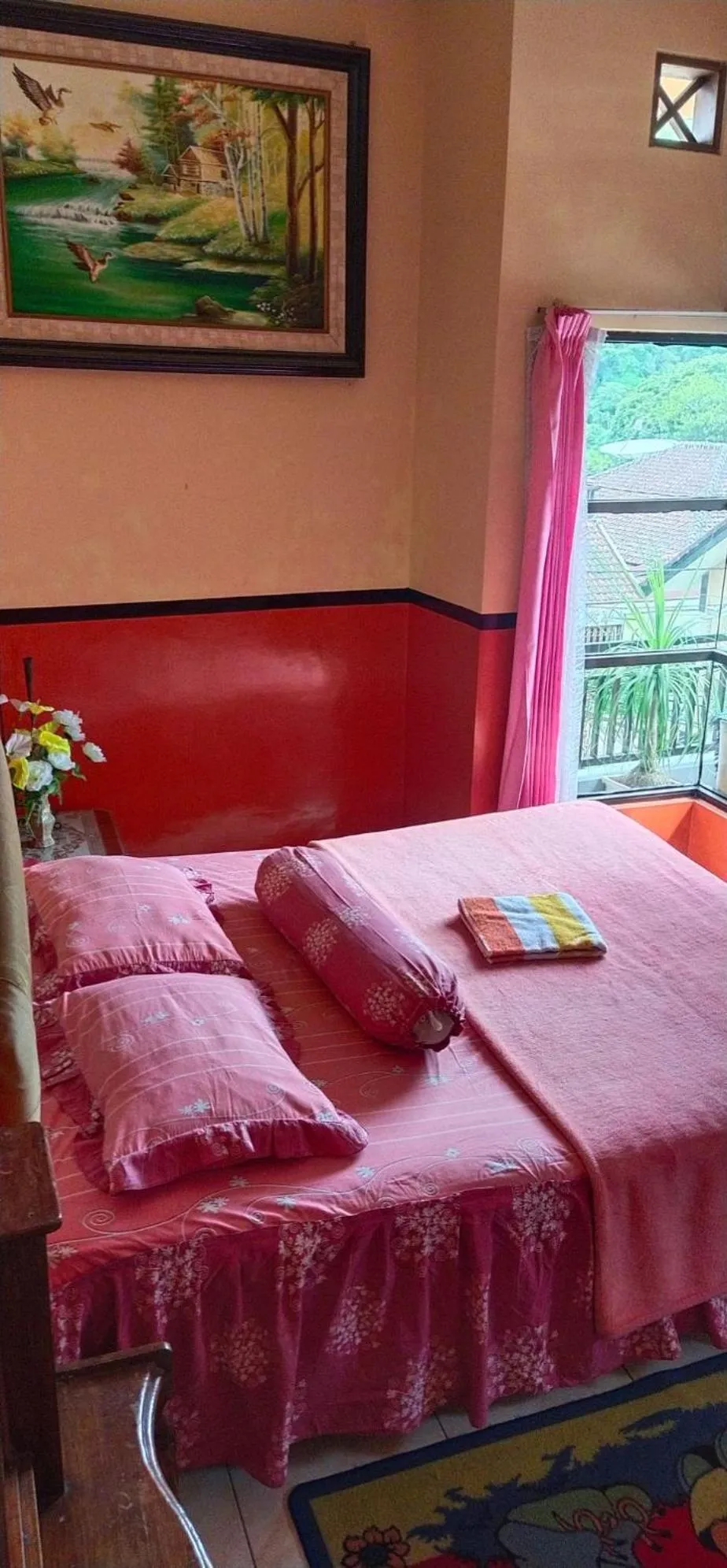 Photo of the whole room, Bed in Penginapan Indah Lestari