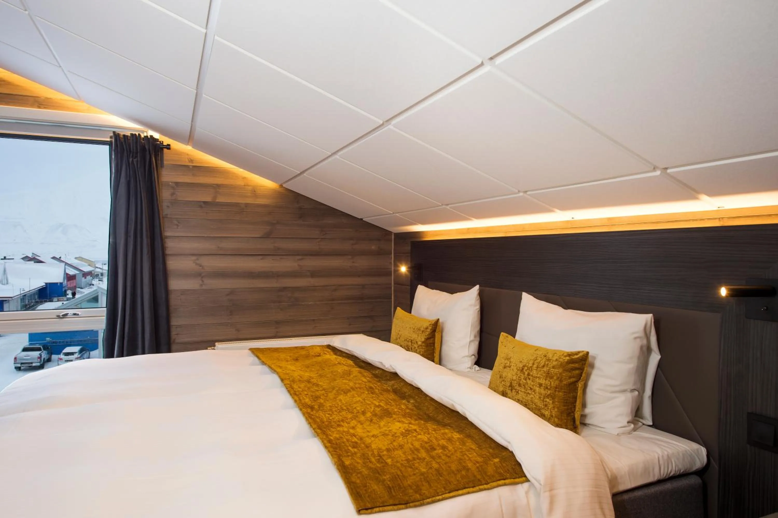 Bedroom, Bed in Svalbard Hotell | Lodge