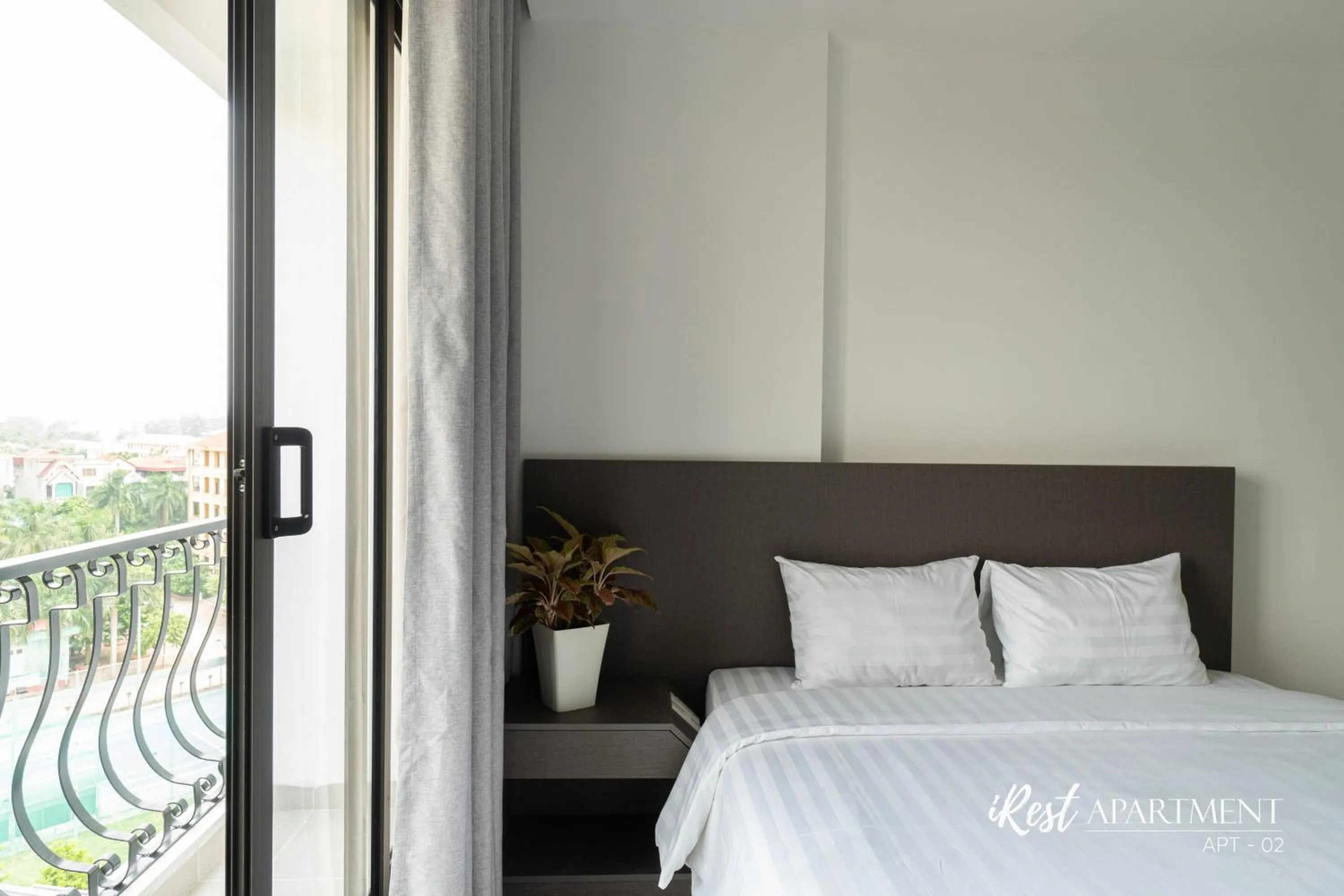 Bed in iRest Apartment Vinh Yen