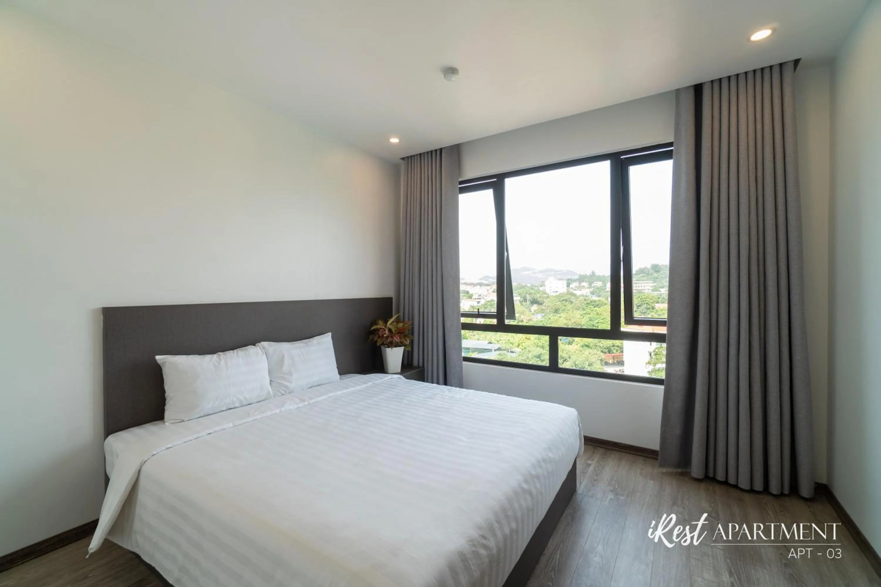 Bed in iRest Apartment Vinh Yen