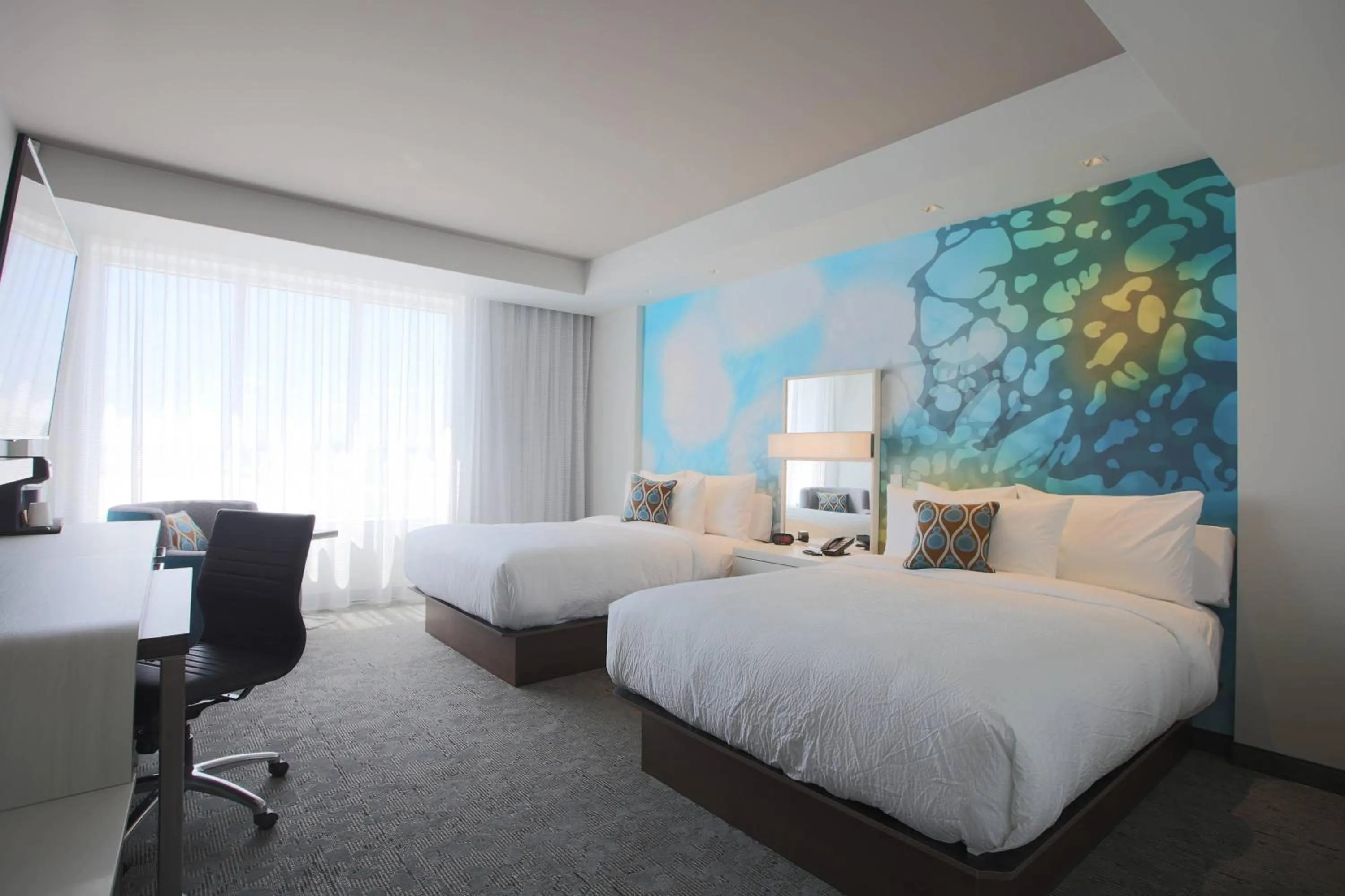 Photo of the whole room, Bed in Courtyard by Marriott Montreal Brossard