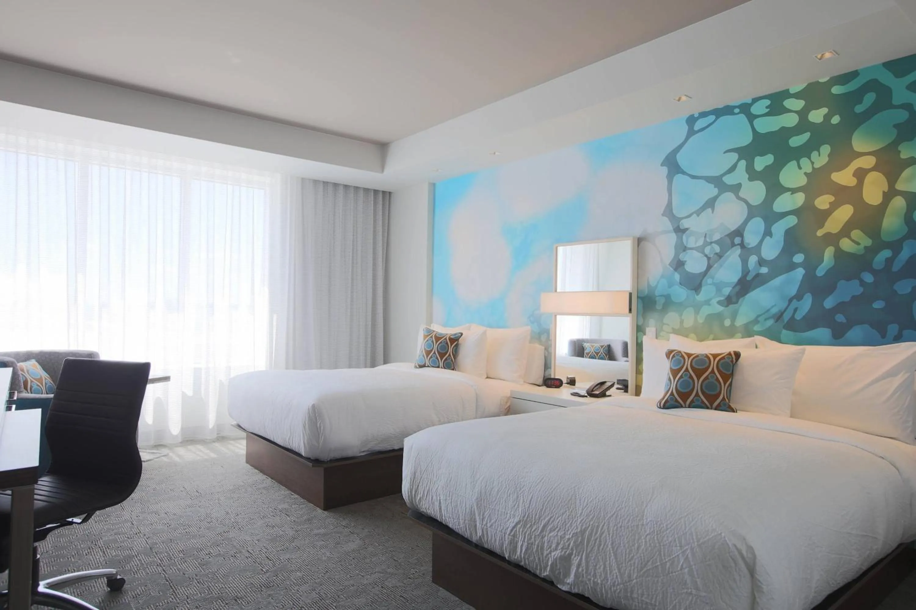 Photo of the whole room, Bed in Courtyard by Marriott Montreal Brossard