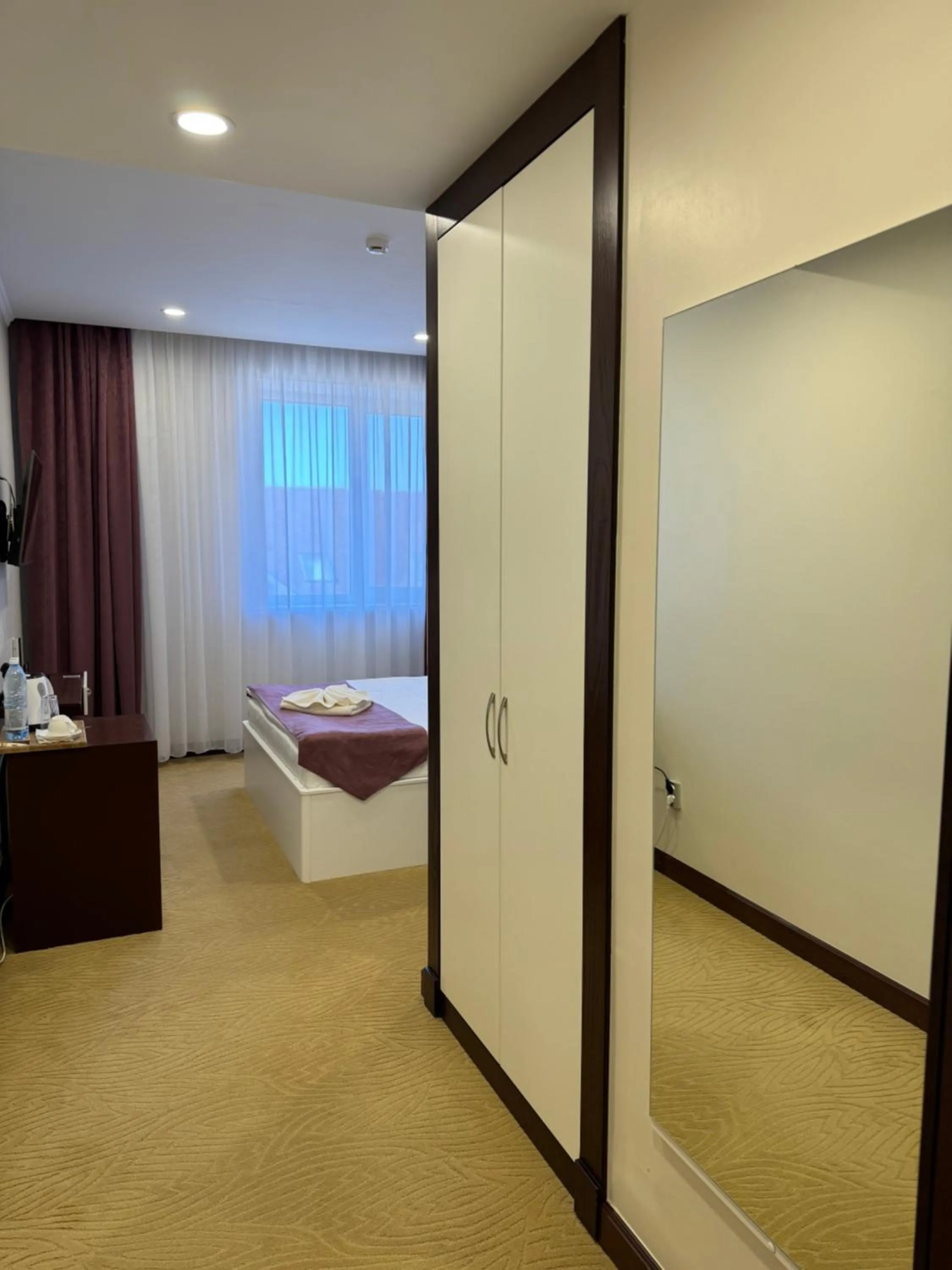 Bed in SULO Atyrau Hotel