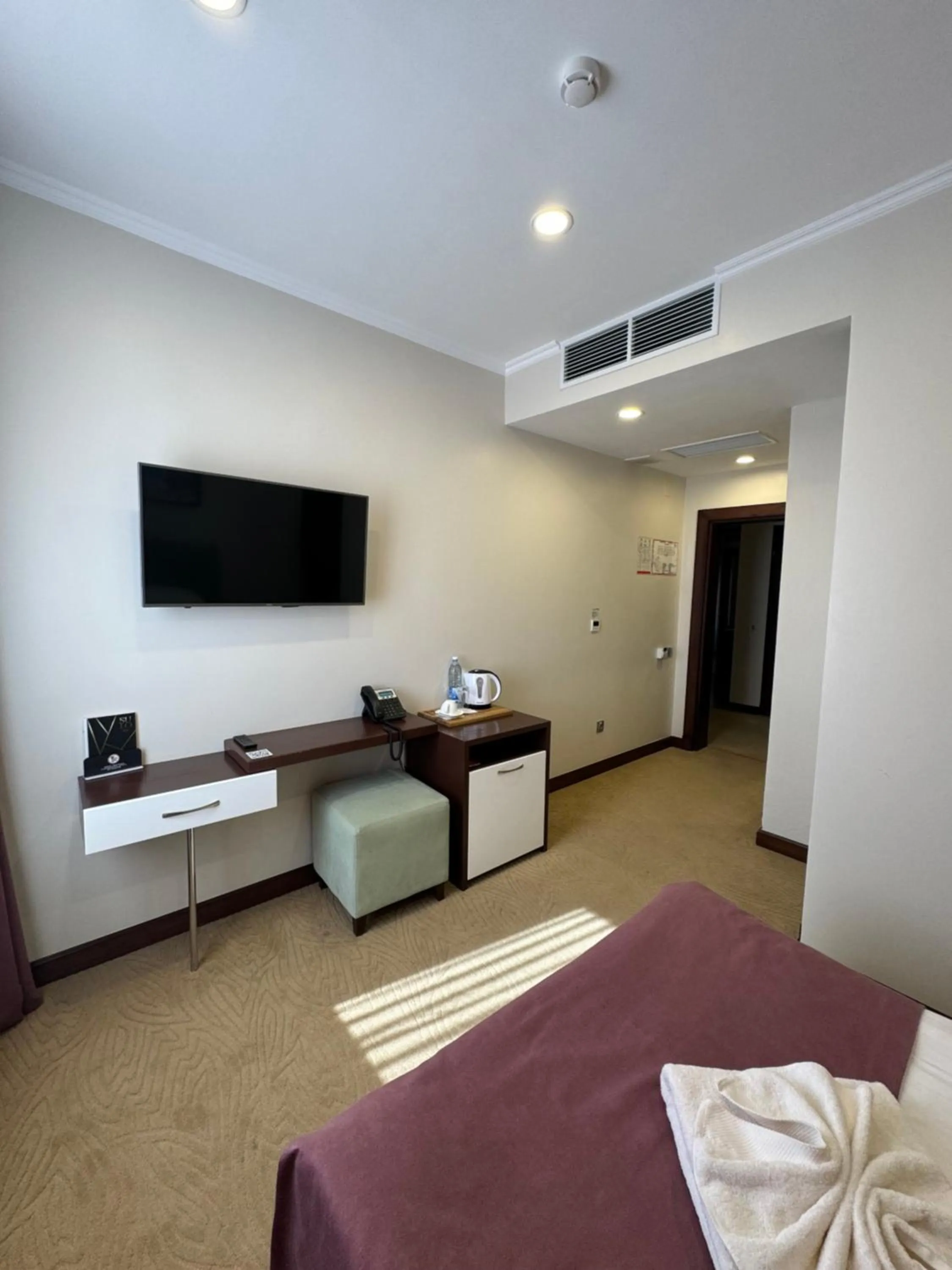 Bed in SULO Atyrau Hotel