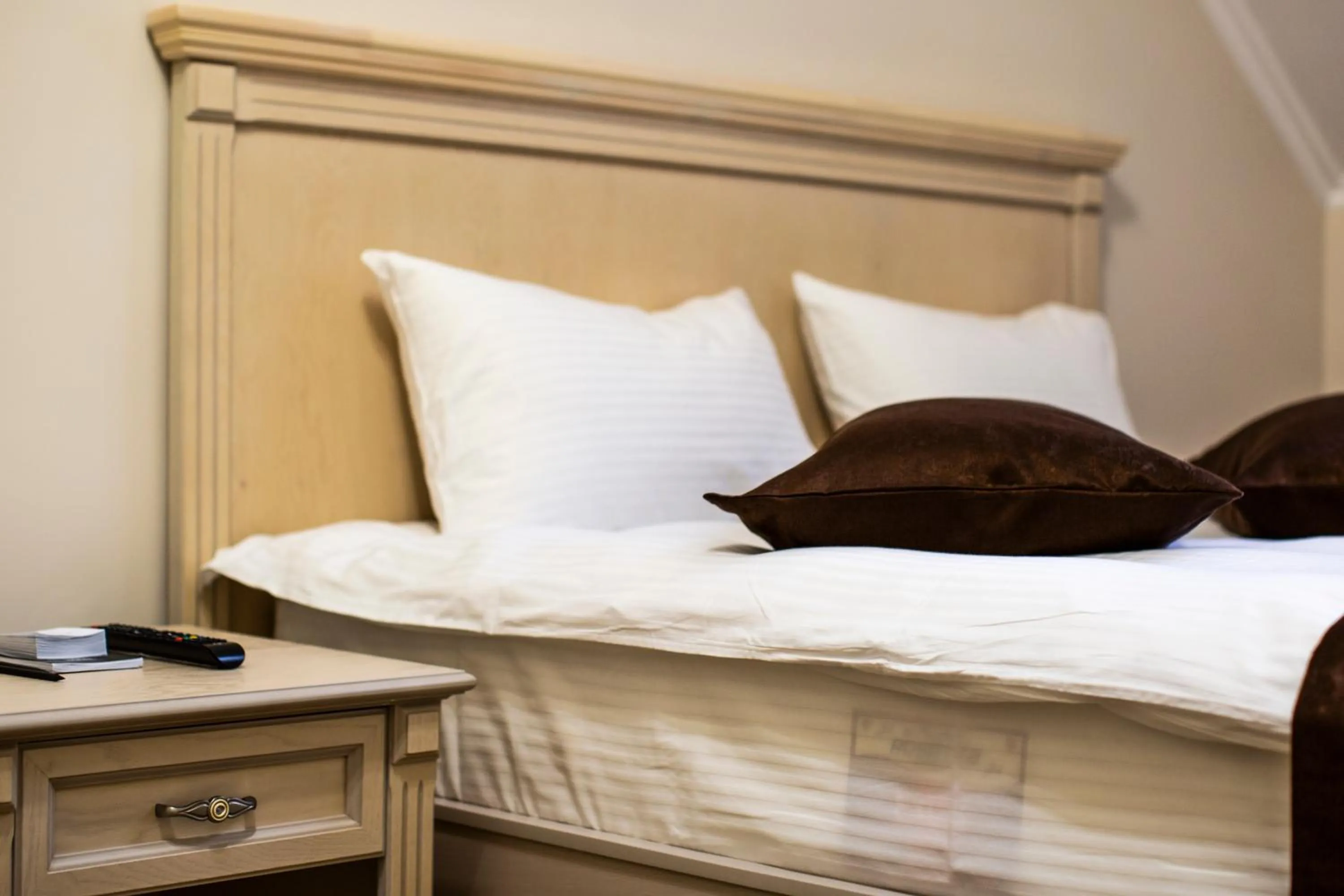 Bed in SULO Atyrau Hotel