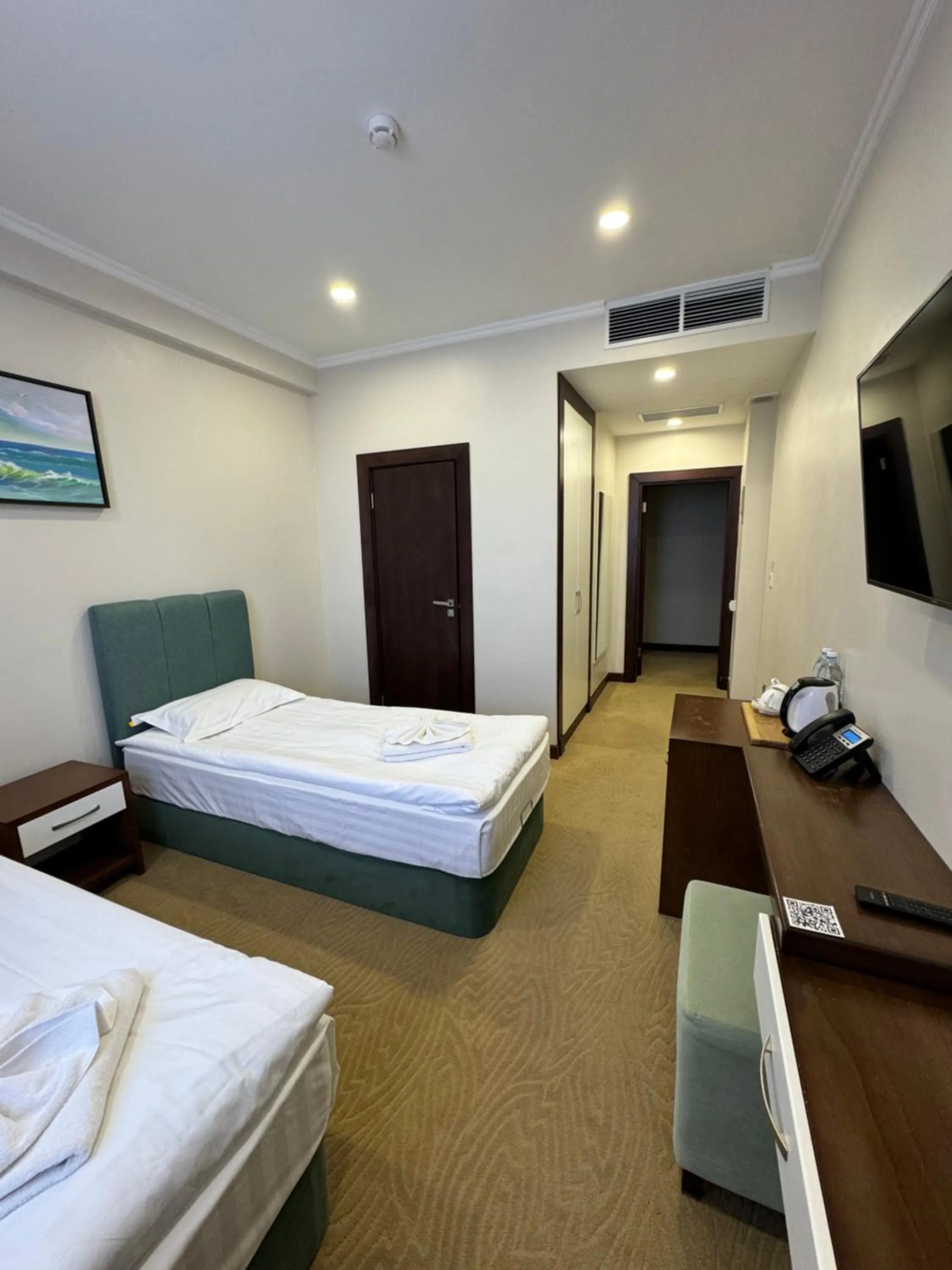 Bed in SULO Atyrau Hotel